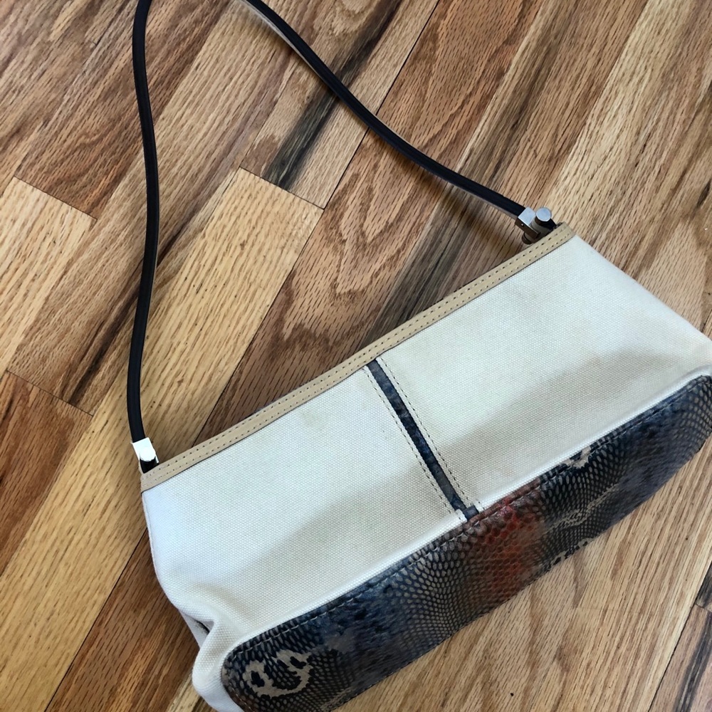 White and fax snake skin purse